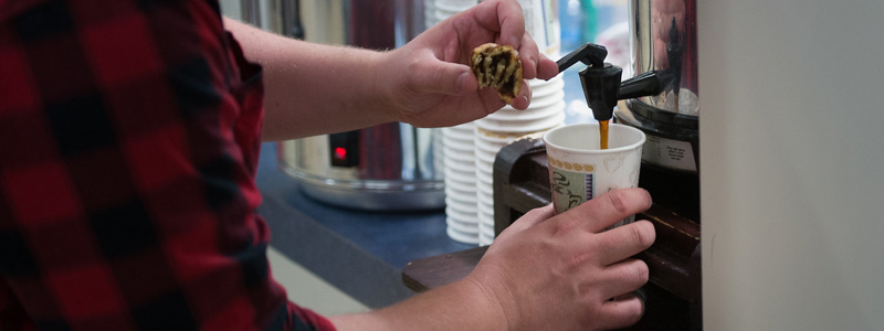 A client pouring tea